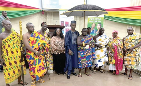 Martey Justice Akita (5th from right), the author, Barima Dr Addofo Kissi I (4th from right), Akyempimhehe of Kwahu Obo, Hajarah Daniels (4th from left), CEO of Larajah Publishers, and other dignitaries after the launch