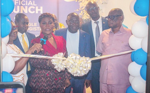 Dorcas Affo Toffey (2nd from left), Deputy Minister of Transport, cutting the ribbon to officially open the centre. Looking on are Dr Kofi Kodua Sarpong (right), Chancellor, UPSA; Dr Joseph Kwaku Horgle  (3rd from left), CEO, J.K. Horgle Transport and Logistic Service, and James Agyenim-Boateng (left), MD, SIC Insurance. Picture: ERNEST KODZI