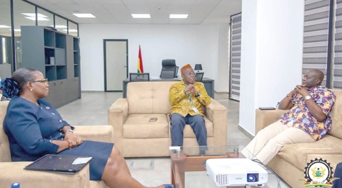 Joseph Nelson (right), Western Regional Minister; Dr Nii Moi Thompson (middle), Chairman of the National Development Planning Commission, and Dr Audrey Smock Amoah (left), Director-General, NDPC, in a discussion during the meeting