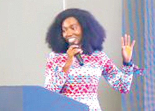 Yaa Owusu-Amoah, (inset), Digital Ecosystem Specialist, United Nations Capital Development Fund Ghana, addressing participants at the event