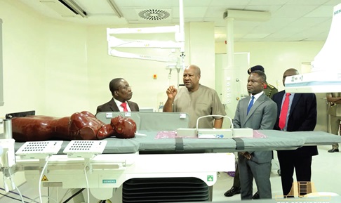 President John Dramani Mahama in a chat with Dr Kow Entsua-Mensah (left), Director of National Cardiothoracic Centre. With them include Kwabena Mintah Akandoh (right), Minister of Health  