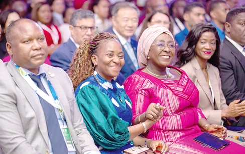 Abla Dzifa Gomashie (3rd from left), Minister of Tourism, Culture and Creative Arts, Ghana and Nabeela Farida Tunis, Minister of Tourism and Culture, Sierra Leone hold hands during official opening of UN Tourism Commission for Africa meeting in Seychelles