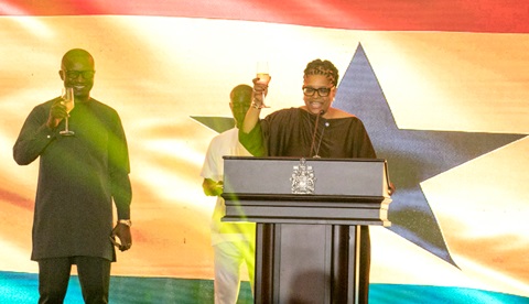 Myriam Montrat (right), High Commissioner of Canada to Ghana, proposing a toast with John Jinapor, Minister of Energy and Green Transition, to mark the anniversary