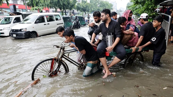 The water has reached knee level in some parts of Dhaka