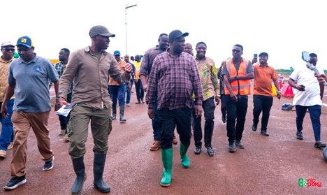 Eric Opoku (3rd from left), Minister of Food and Agriculture, being conducted round one of the construction sites