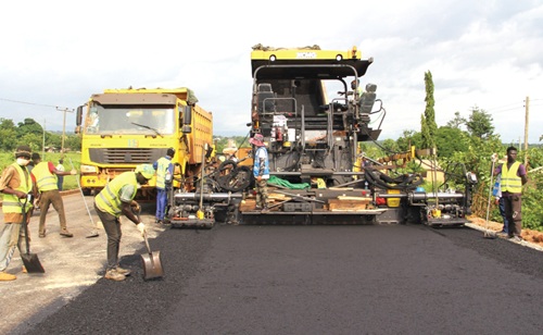 Workers of China Jiangxi Engineering Ghana Limited working on a section of the Nkwanta-Oti Damango section of the upgrading of the Eastern Corridor Road