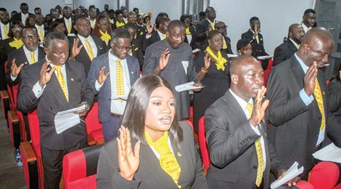 A section of the inductees taking the oath of induction. Picture: ERNEST KODZI