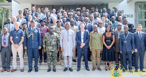 Alhaji Muntaka Mohammed-Mubarak (5th from left), Minister for the Interior, with participants at the end of the 13th Africa Security Symposium 