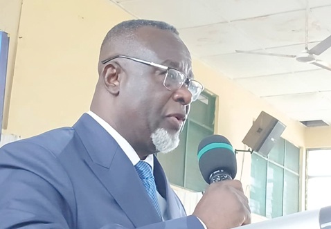 Paul Baffoe-Bonnie (inset), Chief Justice, swearing in executives of the Justice Clubs