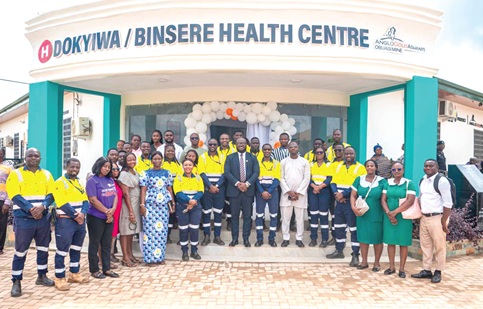 Samuel Boakye Pobee, (arrowed) Managing Director, AGA, with the officials of the AGA and beneficiaries of the projects