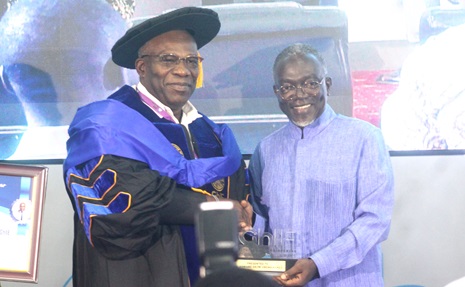 Prof. Douglas Boateng (right), Co-Convenor, GhIE Annual Lecture, presenting a plaque to Edward E. Obeng-Kenzo, VRA Chief Executive. Picture: ESTHER ADJORKOR ADJEI