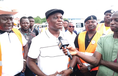 Ahmed Ibrahim, Minister of Local Government, Chieftaincy and Religious Affairs, addressing journalists during the tour