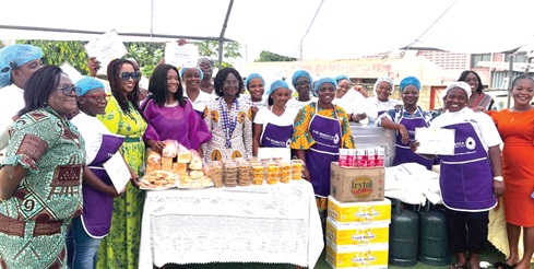 Sheela Sakyi Oppong (4th from left), Monica Bleebo (3rd from left), Very Rev. Comfort Ruth Quartey Papafio (5th from left) and other dignitaries with the trainees in baking after their graduation