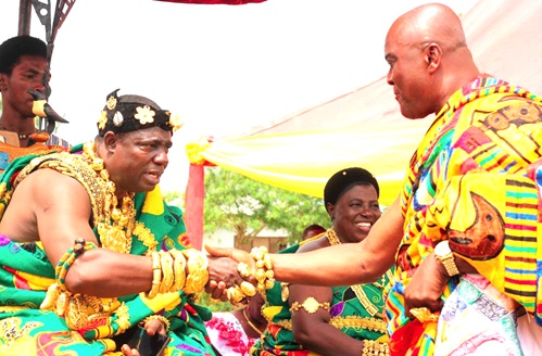 Odeefuo Afankwa III (left), Paramount Chief, Breman Essiam, welcoming Odeefuo Amoakwa Boadu, President, Central Regional House of Chiefs, to a durbar at Breman Essiam in the Central Region