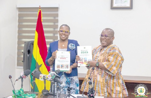 Nii Moi Thompson (right), Chairman, National Development Planning Commission, launching the 2025 national annual progress report. Assisting him is Dr Audrey Smock Amoah (left), Director-General, NDPC. Picture: BENEDICT OBUOBI