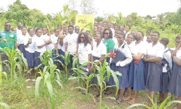 Some teachers and students of the Notre Dame Girl SHS after the tree planting exercise
