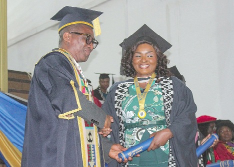 Dela Bonsu, Head of HR, Graphic Communications Group Lt­d, receiving her certificate
