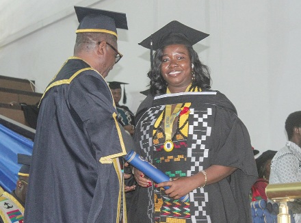 Anna Cobba-Biney receiving her Master of Arts in Management and Administration certificate Anna Cobba-Biney receiving her Master of Arts in Management and Administration certificate