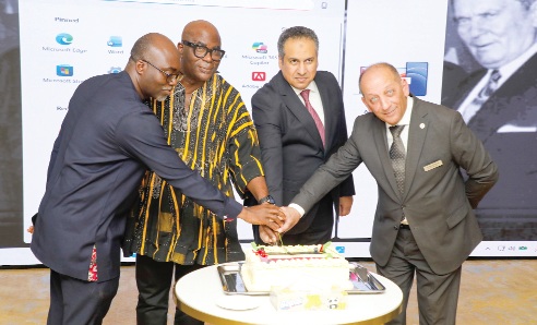 Wael Fathy (2nd from right), Egyptian Ambassador to Ghana, being assisted by Ebenezer Okletey Terlabi (2nd from left), Deputy Minister for the Interior; Desmond Agyemang Baah (left), Chief of Protocol, Ministry of Foreign Affairs, and Philippe Bailloux (right), General Manager, Four Points by Sheraton, to cut the cake to celebrate Egypt’s Revolution Day. Picture: ELVIS NII NOI DOWUONA 