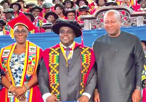 Dr Julius Debrah (middle) joined by President Mahama and Marietta Brew (left), Chairperson, Governing Council of the University of Ghana, after receiving his PhD at the graduation Dr Julius Debrah (middle) joined by President Mahama and Marietta Brew (left), Chairperson, Governing Council of the University of Ghana, after receiving his PhD at the graduation