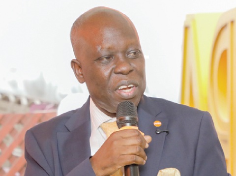 Dr Wilfred Ochan (right), UNFPA Country Representative, speaking to the graduands at the ceremony