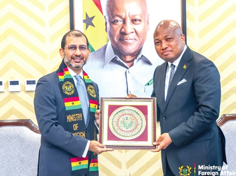 Samuel Okudzeto Ablakwa (right), Minister of Foreign Affairs, receiving the letter of credence from Surinder Bhagat (left), the new Indian High Commissioner to Ghana