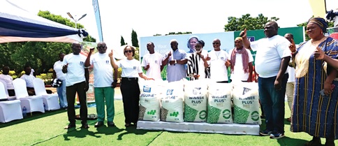 Theresa Randolph (3rd from left), Country Manager of Yara Ghana, Edward Nasara (2nd from left), North East Regional Director of Agriculture, being supported by other staff and dignitaries to unveil the new products
