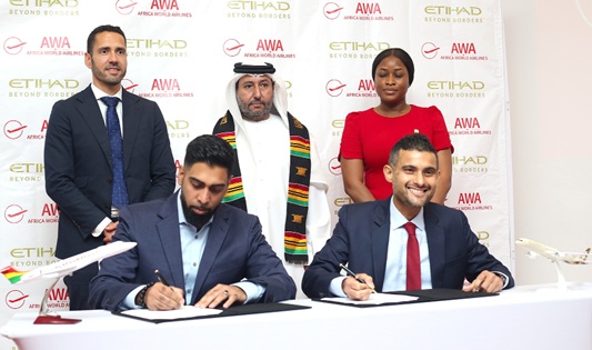 Arik De (left), Chief Commercial and Revenue officer, Ethiad Airways, Sohail Mahmood (right), Chief Operations Officer, Africa World Airlines, signing the Mou. Picture: BENEDICT OBUOBI