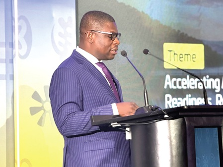 Richard Gyan-Mensah (left), Deputy Minister of Energy and Green Transition, addressing participants in the 2026 Annual General Meetings of the association
