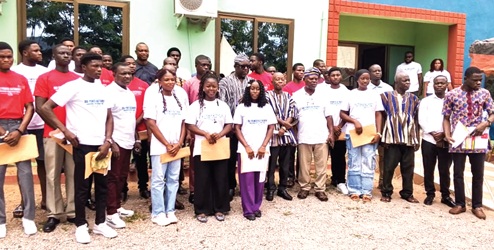 Dignitaries and beneficiaries after the award ceremony at Bui
