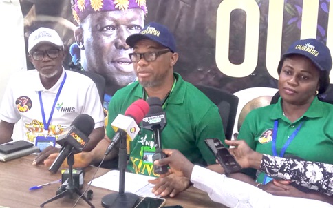 Alhaji Mohammed Muntaka Muniru (middle), Ashanti Regional Director, NHIS, addressing the media