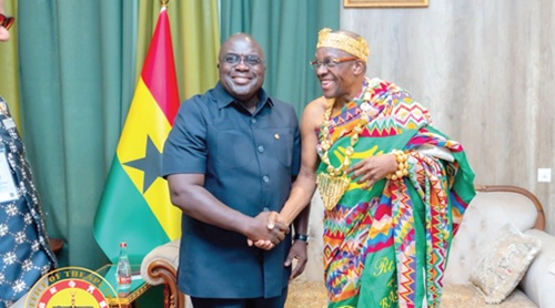 Julius Debrah (left), Chief of Staff, exchanging pleasantries with Alban Sumana Kingsford Bagbin, Speaker of Parliament 