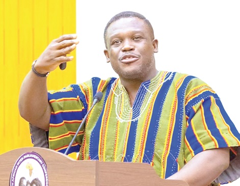 Samuel Nartey George,Minister of Communication, Digital Technology and Innovations, speaking at the conference
