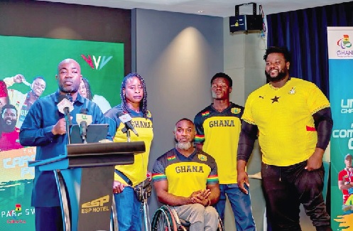• Sampson Deen, President of NPC Ghana, with some members of Ghana's para athletes for the Glasgow Commonwealth Games