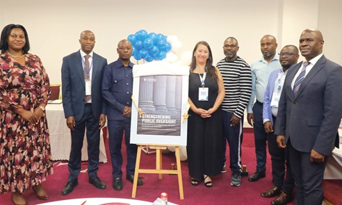 Samuel Nii Odartey Lamptey (3rd from left), Deputy Auditor-General in charge of Commercial Audit Department; with Daniela Patiño Piñeros (5th from right), Programme Lead Public Resources, Transparency International; Paul Banoba (right), Africa Regional Advisor Lead, African Union Engagement, and some dignitaries after launching the report. Picture: ELVIS NII NOI DOWUONA 