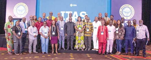 Anthony Kwasi Sarpong (arrowed), Commissioner-Gerneral of the Ghana Revenue Authority, with other GRA staff and stakeholders after the engagement