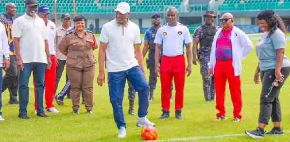 Muntaka Mohammed Mubarak, Minister for Interior, taking the ceremonial kick-off tro start the competition