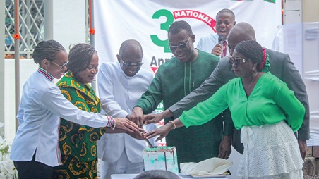 Johnson Asiedu Nketiah (3rd from left), Chairman, NDC, being assisted by Fifi Fiavi Kwetey (3rd from right), General Secretary; Mahama Ayariga, Majority Leader; Dr Zanetor Agyeman Rawlings (left), MP, Klottey Korle, and other officials of the party, to cut the anniversary cake. Picture: ERNEST KODZI