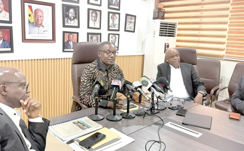 Dr John Jinapor (middle), Minister of Energy and Green Transition, with William Amuna (right), Chairman of the committee established to investigate the Akosombo substation fire outbreak