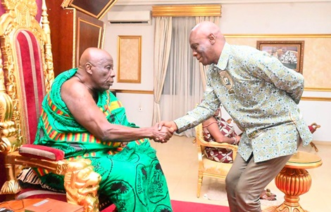 Prof Eric K  Ofori VC of GCU in a handshake with Osagyefuo Amoatia Ofori Panin II, Okyenhene