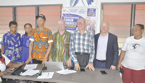 Newton Komla Katseku (middle), Executive Director of GAPA, and other members of the association at the conference