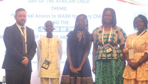 Dominic Richardson (left) from the Learning for Well-being Institute and Patience Hayford (2nd from right), Head of Planning, Budgeting, Monitoring, and Evaluation at the Department of Children, MOGCSP, after their discussion. Picture: ESTHER ADJORKOR ADJEI