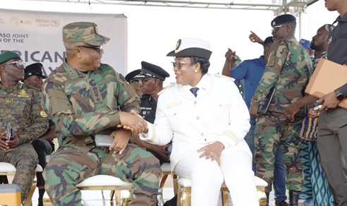 From left- Major General Anthony Ntem (left), Commissioner-General of the Ghana Boundary Commission, and Madam Yvette Massadalou Sanou, the Governor of Nazino Region of Burkina Faso, exchanging pleasantries