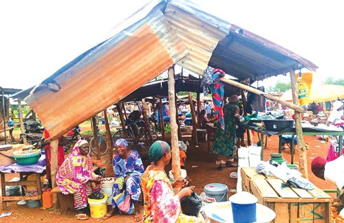 Some traders display their  items under the makeshift structure for sale