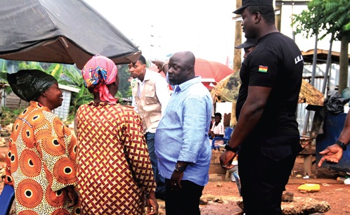Richard Ofori-Agyeman Boadi, Metropolitan Chief Executive for KMA, speaking to some of the affected residents Richard Ofori-Agyeman Boadi, Metropolitan Chief Executive for KMA, speaking to some of the affected residents