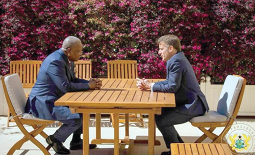 FLASHBACK: President John Dramani Mahama (left) having a private chat with President Emmanuel Macron during his recent visit to France