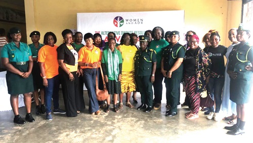 Members of the Women and ADR organisation and officers of the Immigration Service