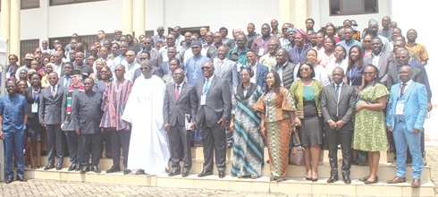Ebenezer Ahumah Djietror (3rd from left), Clerk to Parliament, with Prof. Robert Darko  Osei (7th from right), Director, ISSER; Bernard Ahiafor (6th from left), First Deputy Speaker  of Parliament; Prof. Felix Ankomah Asante (8th from left), Pro-Vice Chancellor, Research, Innovation and Development; some dignitaries and other participants. Picture: ERNEST KODZI