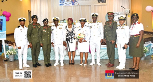 Sub Lieutenant Rebecca Owusu (5th from right), the author, with Prof. Goski Alabi (5th from left), guest of honour, and senior military officers after the launch of the books