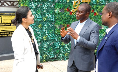 Dr Joseph Bikanyi Kuyon (middle), Director-General, National Disaster Management Organisation, interacting with Priya Gujadhur (left), Interim Representative, Food and Agriculture Organisation, after the forum. Picture: ELVIS NII NOI DOWUONA 